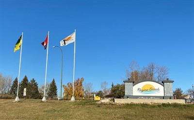 brick sign with flags